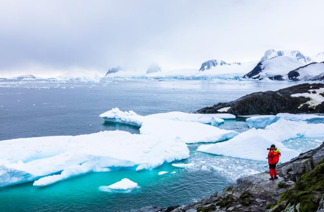 scientist on icy landscape